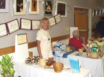 Margie with Raffle Prizes
